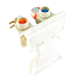 WH13X26534 GE Washer Water Inlet Valve – Rear Angle View Showing Hot and Cold Threaded Inlet Ports with Orange and Blue Color Caps
